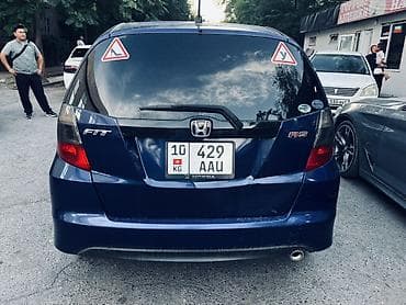 мото мини: Honda Fit: 2009 г., 1.5 л, Автомат, Бензин, Хэтчбэк — 5