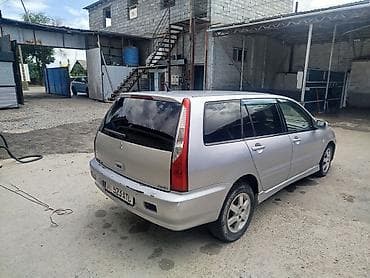шины колеса: Mitsubishi Lancer: 2003 г., 1.6 л, Механика, Бензин, Универсал — 3
