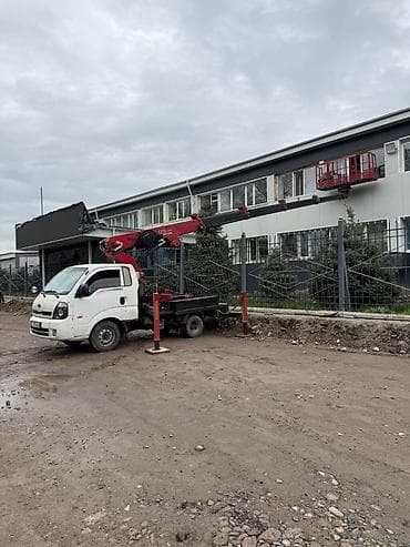 кладка забора: Услуги автовышки (манипулятора с люлькой) - Работа на высоте — 2