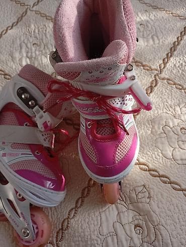 налокотники: Продаю ролики розового цвета для девочек, в хорошем состоянии. Размер — 2