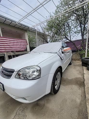шавралет лассети: Chevrolet Lacetti: 2010 г., 1.4 л, Седан — 5