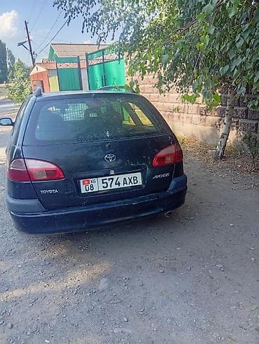 Toyota Avensis универсал (первое поколение),чорный цвет. состояние — 2