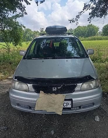 подкрылок одиссей: Honda Odyssey: 1994 г., 2.3 л, Автомат, Бензин, Универсал — 2