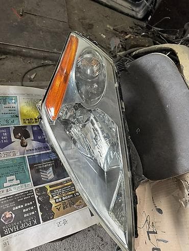 led h11: Передняя левая фара Nissan 2005 г. — 2