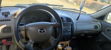 авто запчасти на ауди: Mazda 323: 2000 г., 1.8 л, Автомат, Газ, Седан — 5