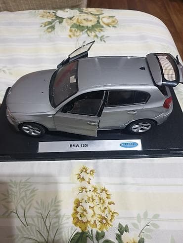 ra 1: Коллекционная масштабная модель BMW 120i (Welly). Зеркала дверные — 2