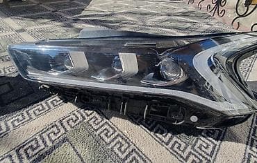 Глушители: Комплект передних фар Kia 2020 г., Б/у, Оригинал — 2