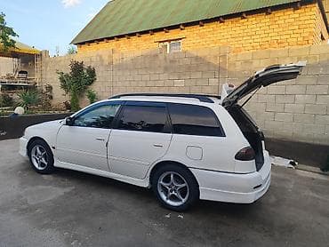 mcv 21: Универсал белого цвета, правый руль. Просторный кузов с большим — 9