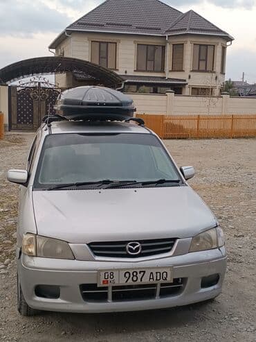 домкрат гидравлический для вытяжки авто: Mazda Demio: 2001 г., 1.3 л, Автомат, Бензин — 7