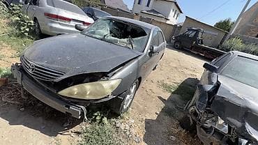естима 2005: Toyota Camry XV30, комплектация LE, седан, цвет тёмно‑серый — 3