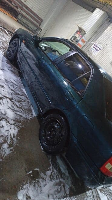 продаю или меняю на дом: Mazda 323: 2000 г., 1.6 л, Механика, Бензиновая, Седан — 11