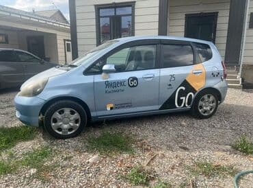пресс чөп: Honda Fit 2003 
Кыргыз номерде — 1