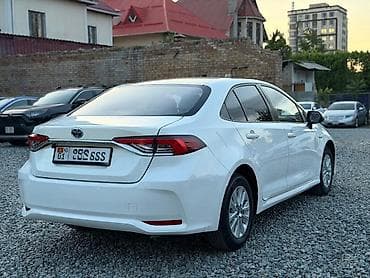 eclipse cross: Toyota Corolla: 2022 г., 1.8 л, Вариатор, Гибрид, Седан — 4