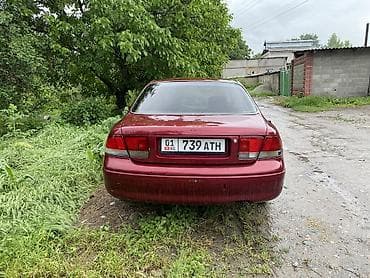 626: Mazda 626: 1995 г., 2 л, Механика, Бензин, Седан — 4