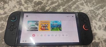 wild: Nintendo Switch OLED + сменные геймпады Hori Split Pad Pro - Модель — 2