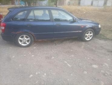 e klass: Mazda 323: 2000 г., Механика, Бензин — 3