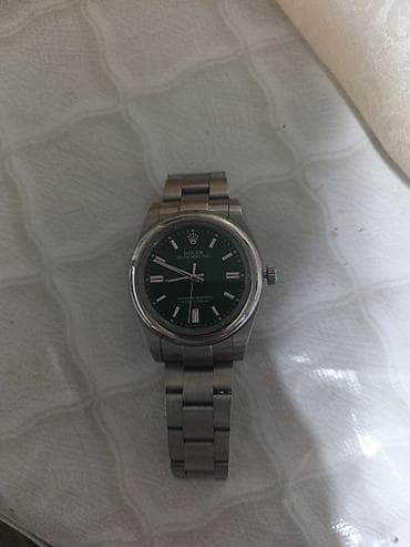 Личные вещи: Часы Rolex Oyster Perpetual с зелёным циферблатом. - Корпус и — 2