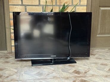 Экраны для проекторов: Телевизор Samsung с плоским экраном, диагональ около 32" (визуально) — 2