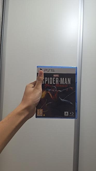 Игры для PlayStation: Игра для PlayStation 5 — Marvel’s Spider‑Man: Miles Morales (дисковая — 1