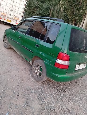 Mazda Demio: 1998 г., 1.3 л, Автомат, Бензин, Седан lalafo.kg да Mazda Demio: 1998 г., 1.3 л, Автомат, Бензин, Седан