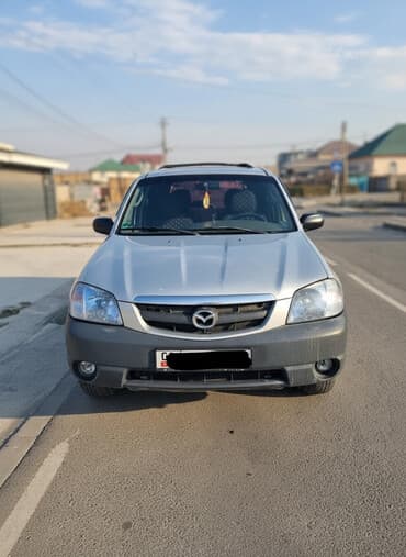 продаю связи с переездом: Mazda Tribute: 2001 г., 2 л, Механика, Бензиновая, Внедорожник — 3