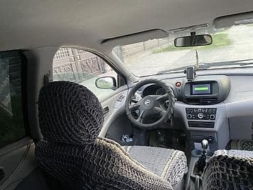 Nissan Almera Tino: 2003 г., 1.8 л, Механика, Бензин, Хэтчбэк — 10