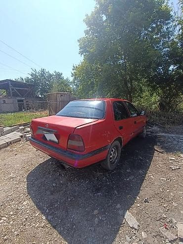 Nissan Sunny: 1991 г., 1.6 л, Механика, Бензин, Седан