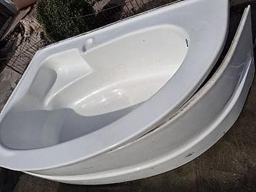 Угловая акриловая ванна с фронтальной декоративной панелью