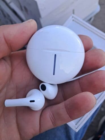 без проводной микрофон: Беспроводные наушники-вкладыши с зарядным футляром (круглый кейс) - — 19