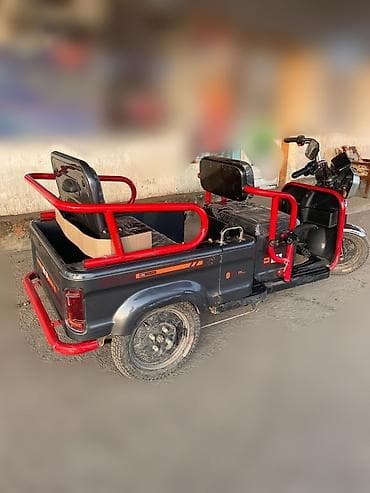 Спорт и отдых: Электрический трицикл (грузо‑пассажирский) - Компоновка: три колеса — 9