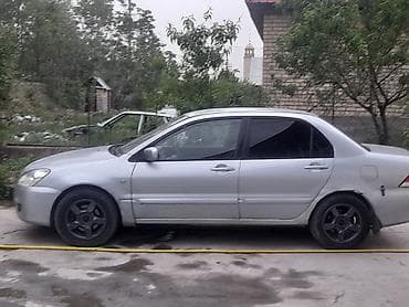 zimmer e9 pro: Mitsubishi Lancer: 2005 г., 1.6 л, Ручные, Бензин, Седан — 1