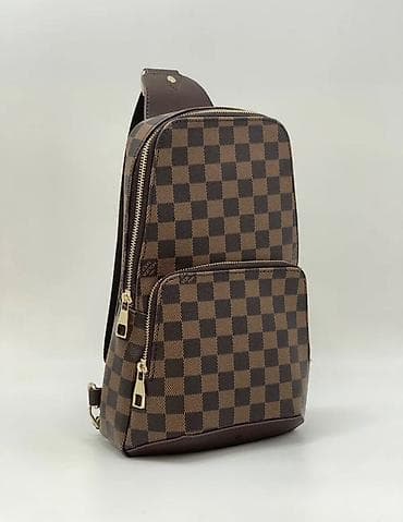 Аксессуары: Стильная мужская сумка-бананка от Louis Vuitton станет идеальным — 1