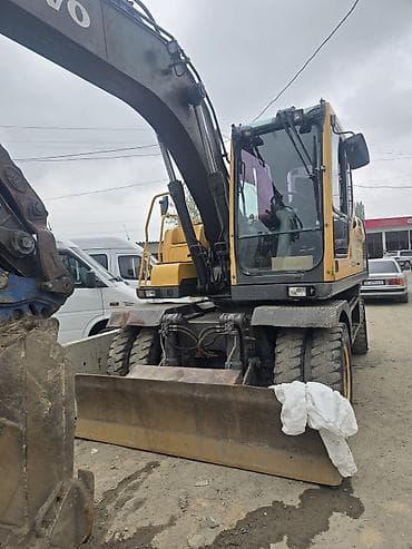 обмен сельхозтехники: Экскаватор, Volvo, 2015 г., Колесный — 5