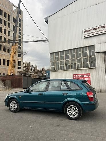 одисей 1999: Mazda 323: 1999 г., 1.5 л, Автомат, Бензин, Универсал — 5
