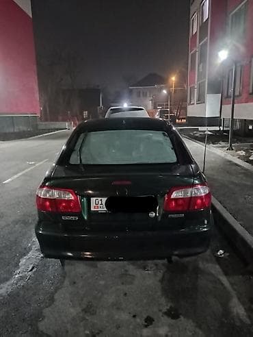 65 style: Mazda 626: 1999 г., 1.8 л, Механика, Бензин, Седан — 5