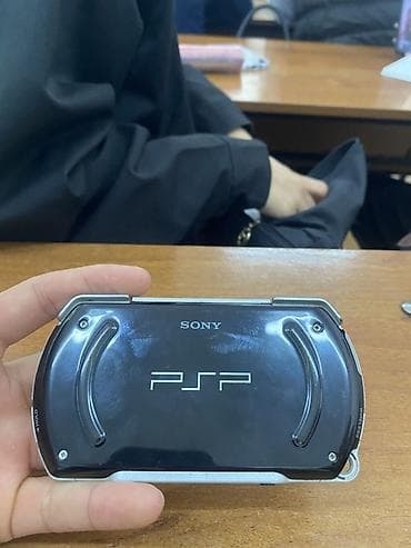 ps camera: Sony PSP Go (N1000) — портативная игровая консоль с выдвижным — 3