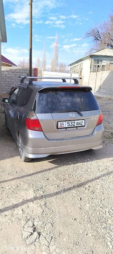 диск 4х100: Honda Fit: 2003 г., 1.3 л, Автомат, Бензин, Хэтчбэк — 2