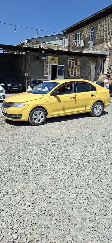 авто стенд: Skoda Rapid: 2015 г., 0.6 л, Механика, Бензин, Седан — 1