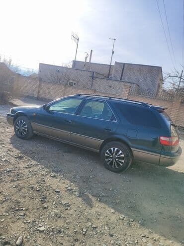 багажник спада: Toyota Camry: 1997 г., 2.5 л, Автомат, Бензин, Универсал — 6