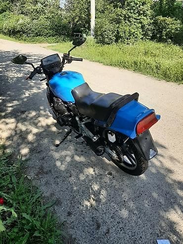 Suzuki: Мотоцикл дорожный, сузуки бандит. Основные особенности: - — 7