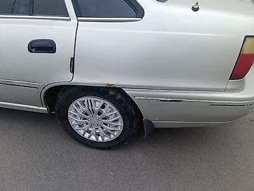 маленькие электро машины: Daewoo Nexia: 2005 г., Механика, Бензин, Седан — 4