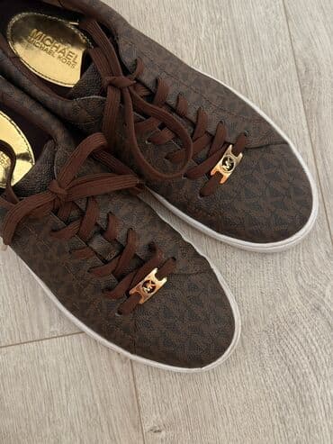 Кроссовки Michael Kors в отличном состоянии как новые Размер 9M