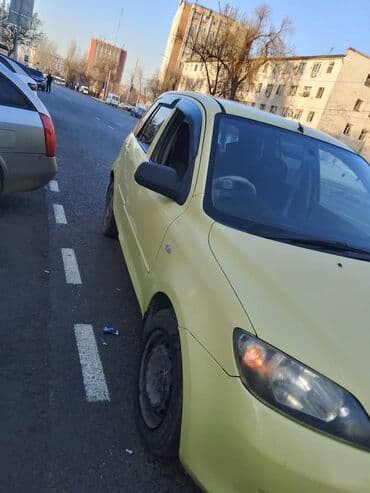 автомобили для инвалидов с ручным управлением: Mazda Demio: 2003 г., 1.3 л, Автомат, Бензиновая, Хэтчбэк — 5