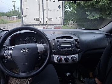бюджетные авто: Hyundai Elantra: 2010 г., 1.6 л, Механика, Бензин, Седан — 4