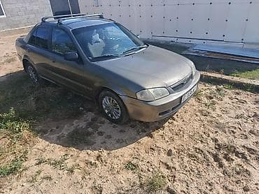 купить моторную лодку: Mazda Familia: 2001 г., Автомат, Седан — 3