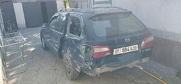 Продажа авто: Mazda Familia: 1999 г., 1.5 л, Механика, Бензин, Универсал — 5