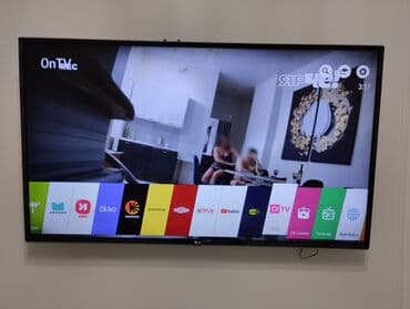 пульт на телевизор lg: Смарт‑телевизор LG, диагональ около 55–60". Тонкие рамки, настенное — 2
