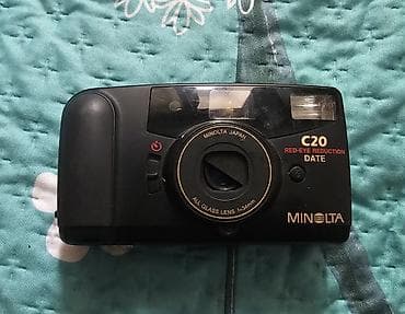 eos 1100d: Пленочный фотоаппарат Minolta C20 Date с одной стороны сломан — 1