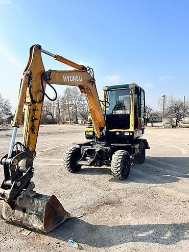 червяк 124: Экскаватор, Hyundai, 2013 г., Колесный — 2