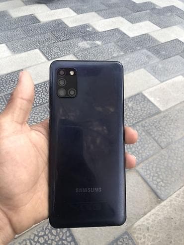 3 симочный: Samsung Galaxy A31, Б/у, 64 ГБ, цвет - Черный, 2 SIM — 1